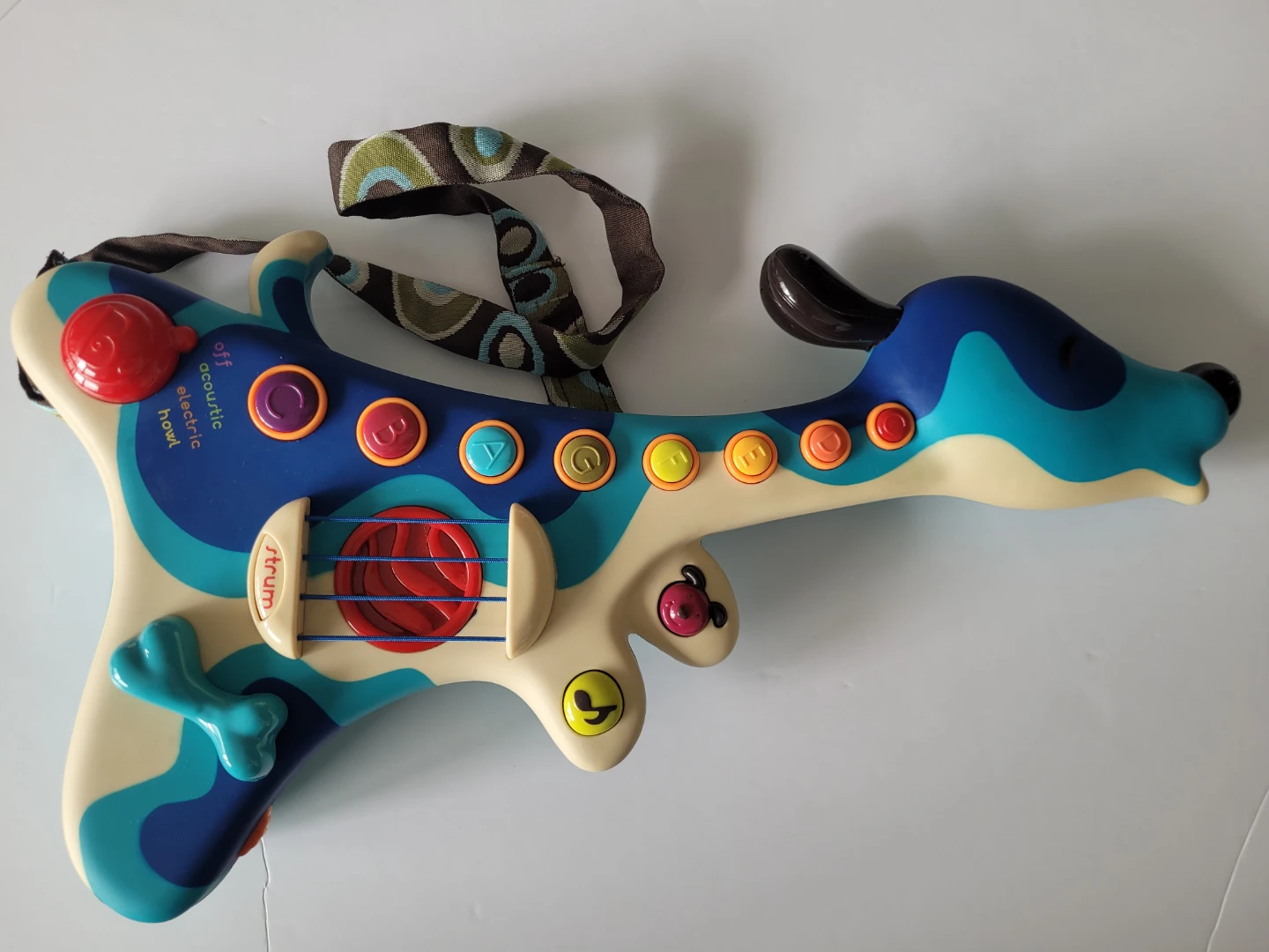 B. Toys Woof Guitar