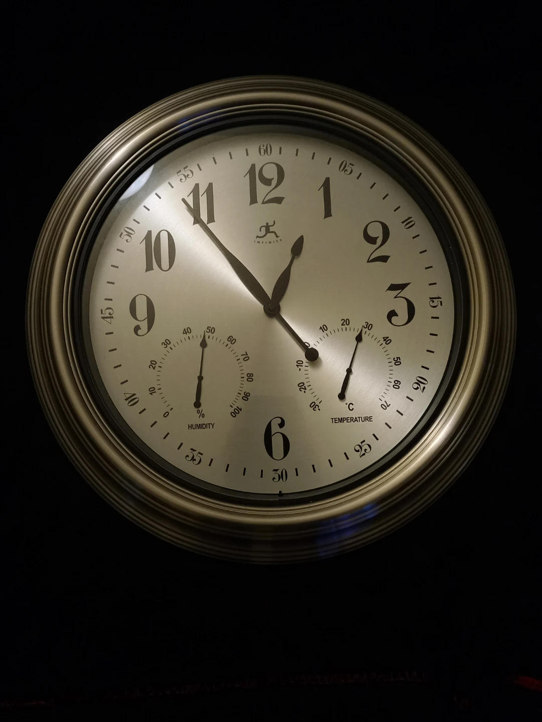 Infinity Wall Clock with Temperature and Humidity Gauge