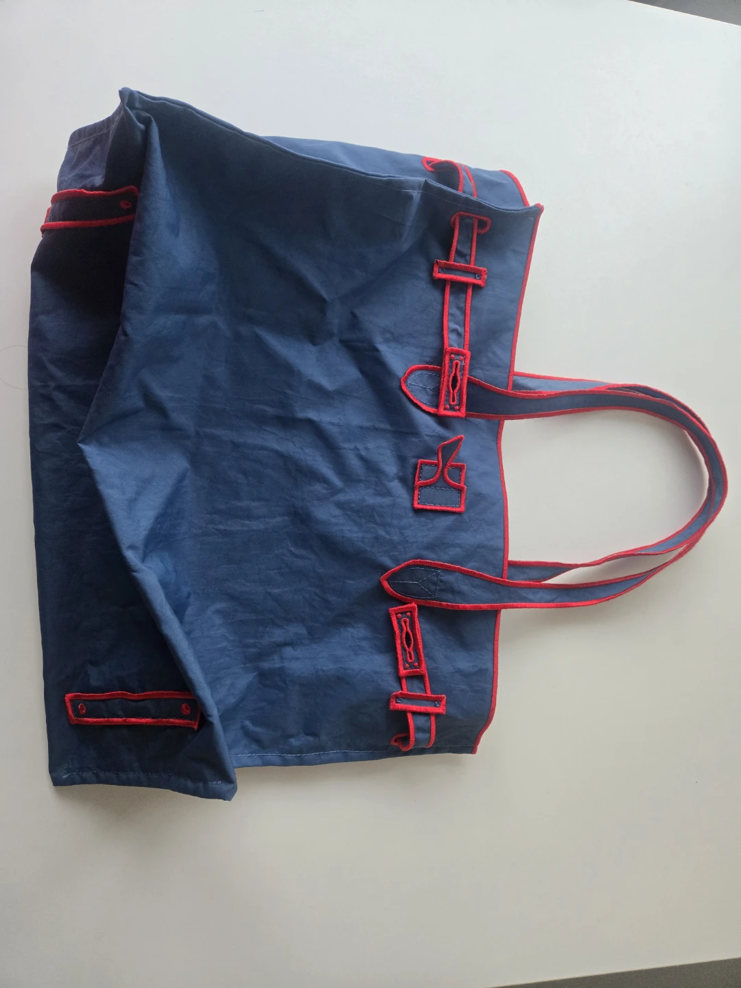 Blue tote bag with red trim