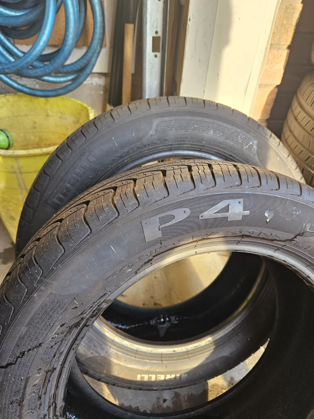 Two Pirelli P4 All Season Tires