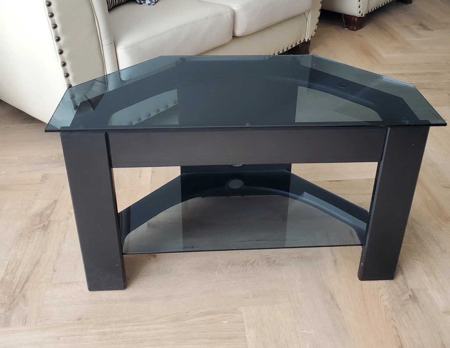 Black corner TV stand with glass top
