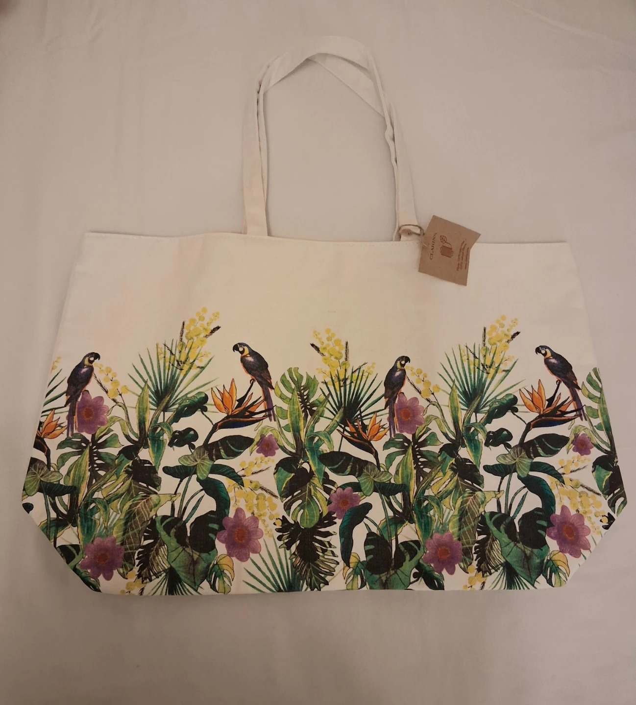 CLARINS CREAM TOTE BAG WITH TROPICAL PARROT PRINT