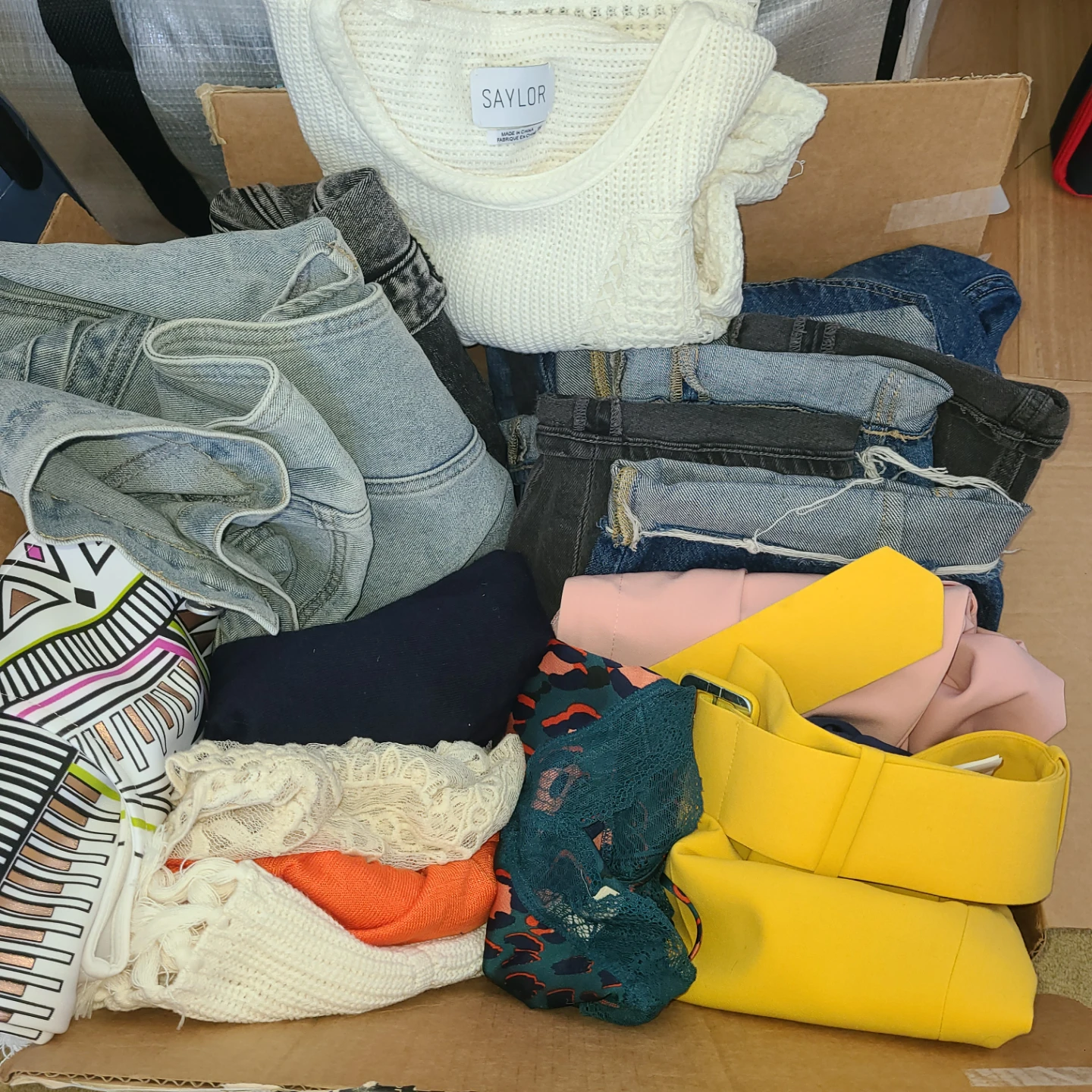 Bundle of Women's Clothing - Tops, Pants, and Denim Vest