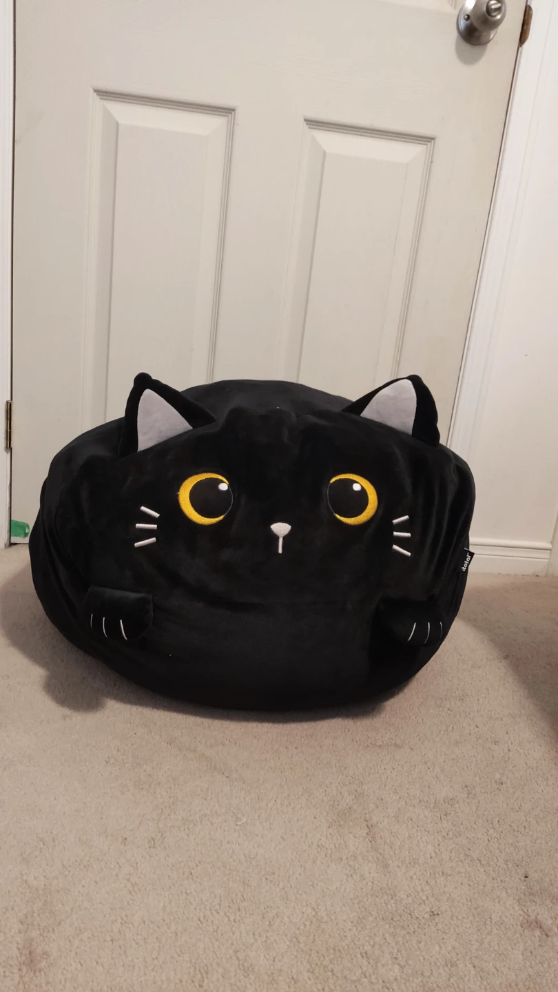Large plush cat-shaped pillow