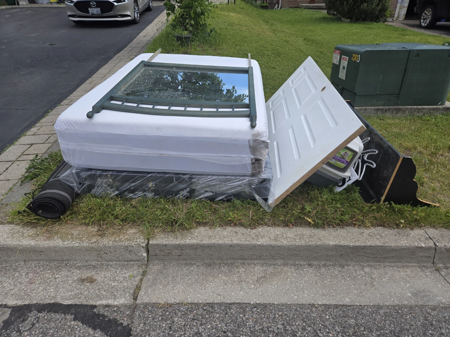 White Mattress, Mirror, and Door
