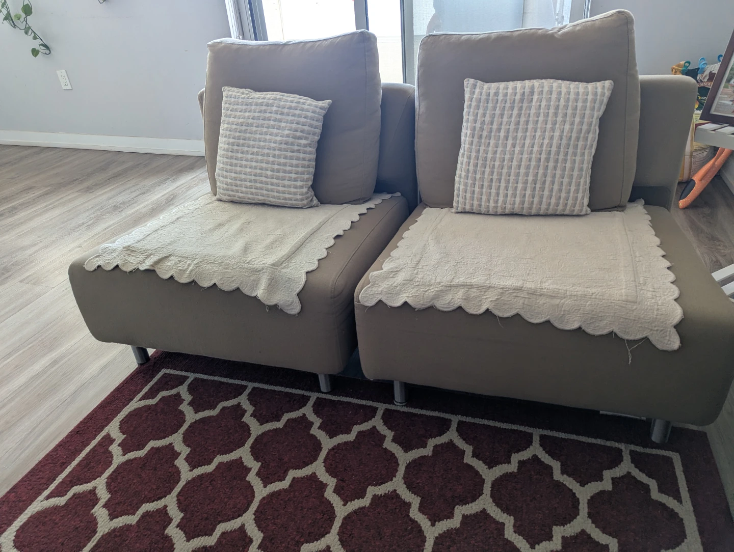 Two Beige Sofa Armrest Covers with Scalloped Edges