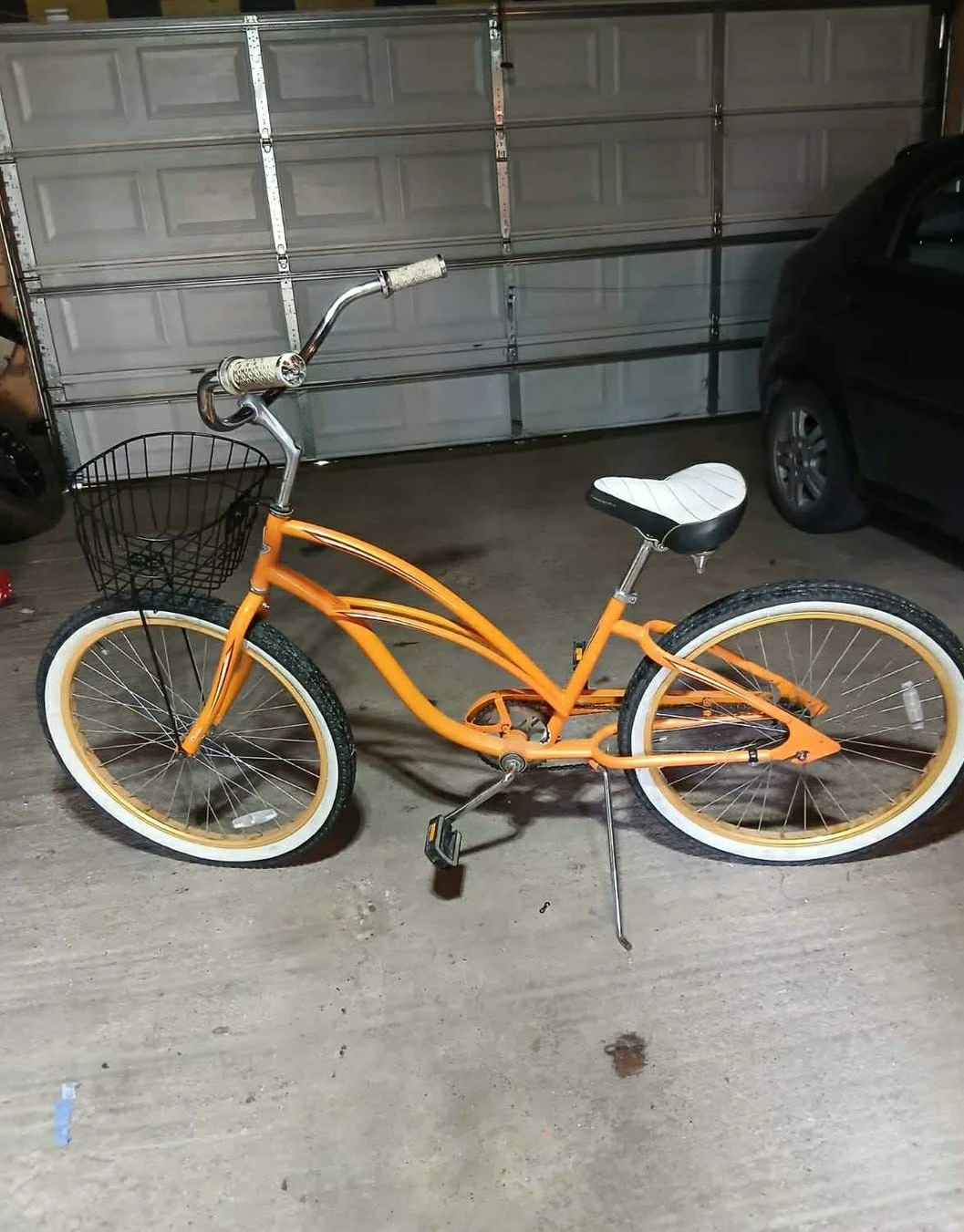 Orange Cruiser Bicycle with Front Basket