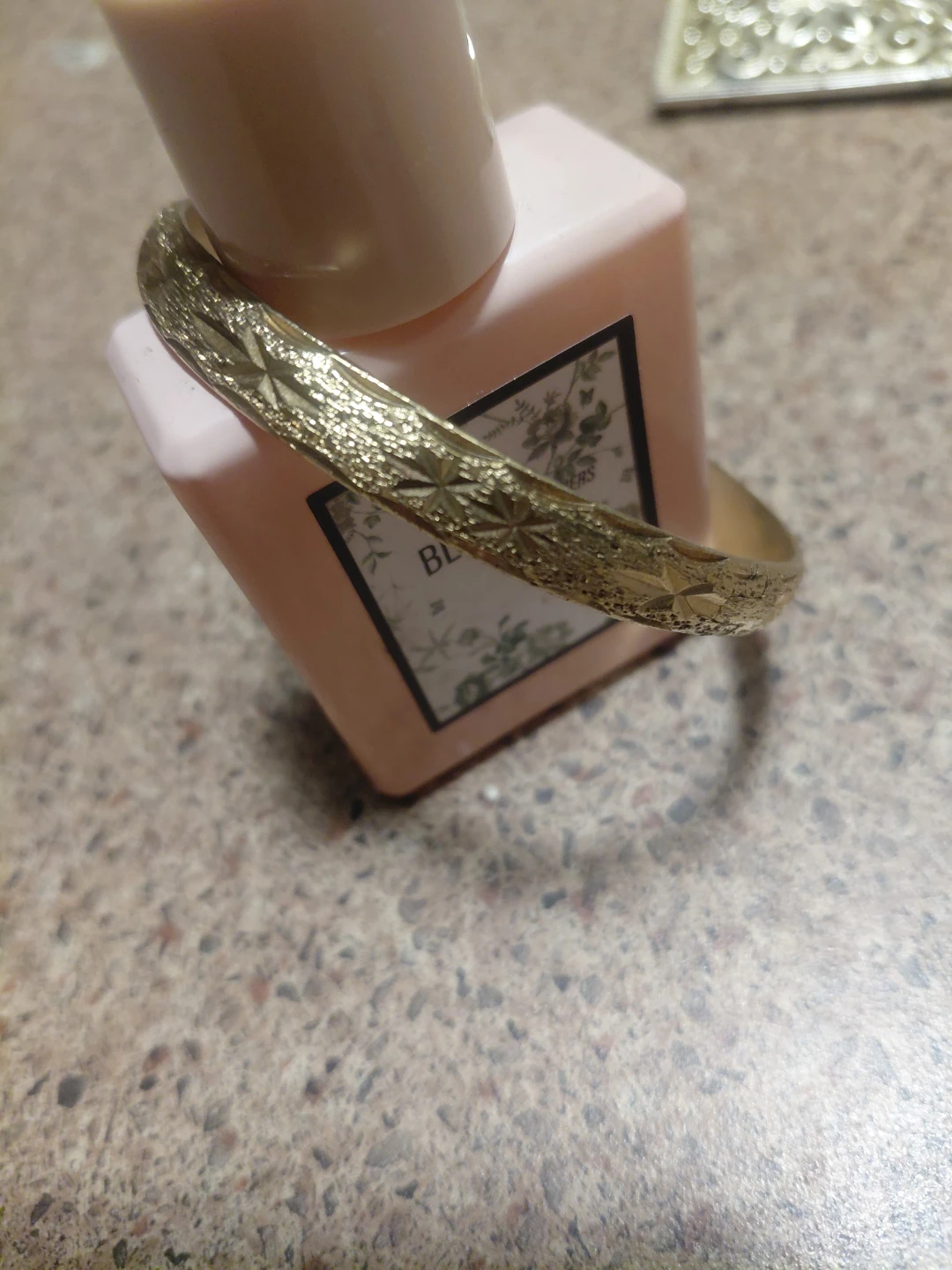 Gold-tone Bangle Bracelet with Star Pattern