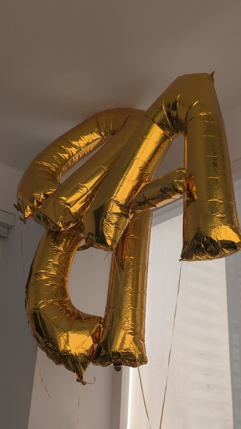 Gold letter balloons