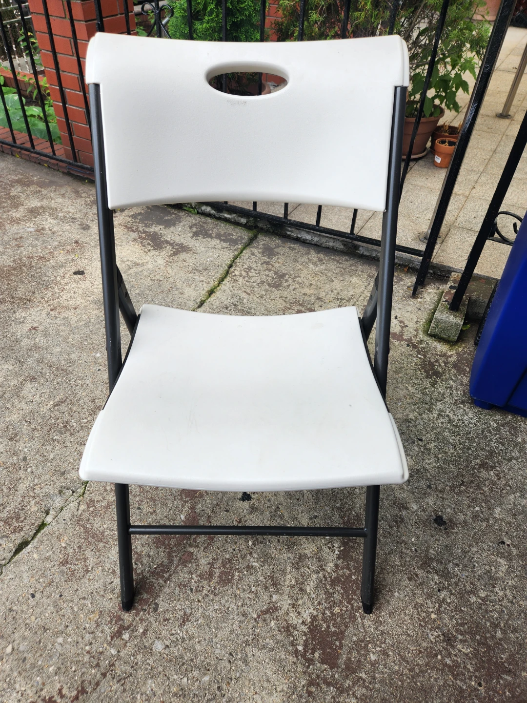 White Folding Chair with Black Frame