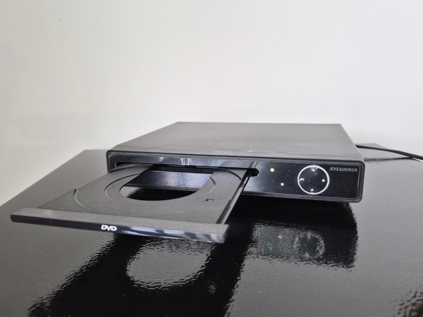 Read Bio | Sylvania DVD Player (no remote - read bio)