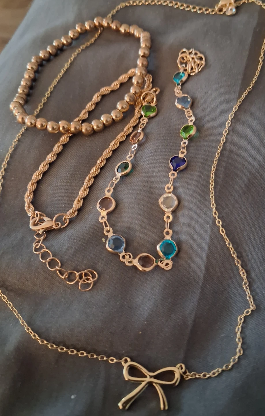 Gold Tone Necklaces Set with Bow and Gem Accents