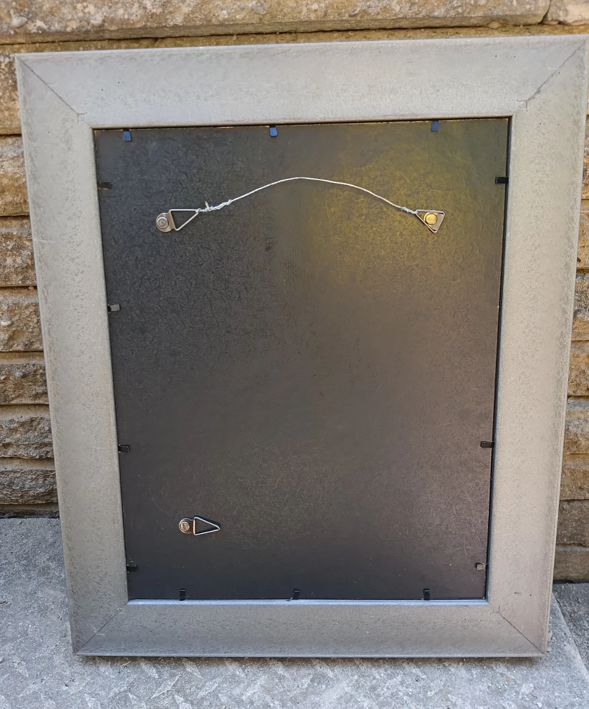 Wall mounted frame