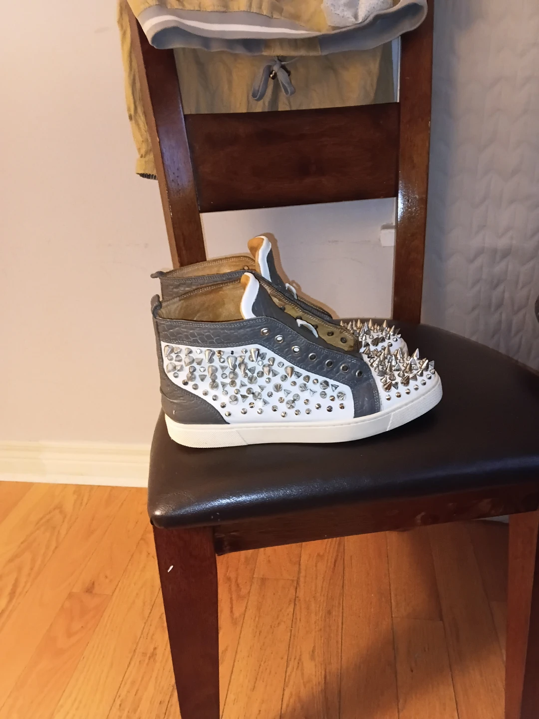 Christian Louboutin Spiked red bottom sneakers - photo 4