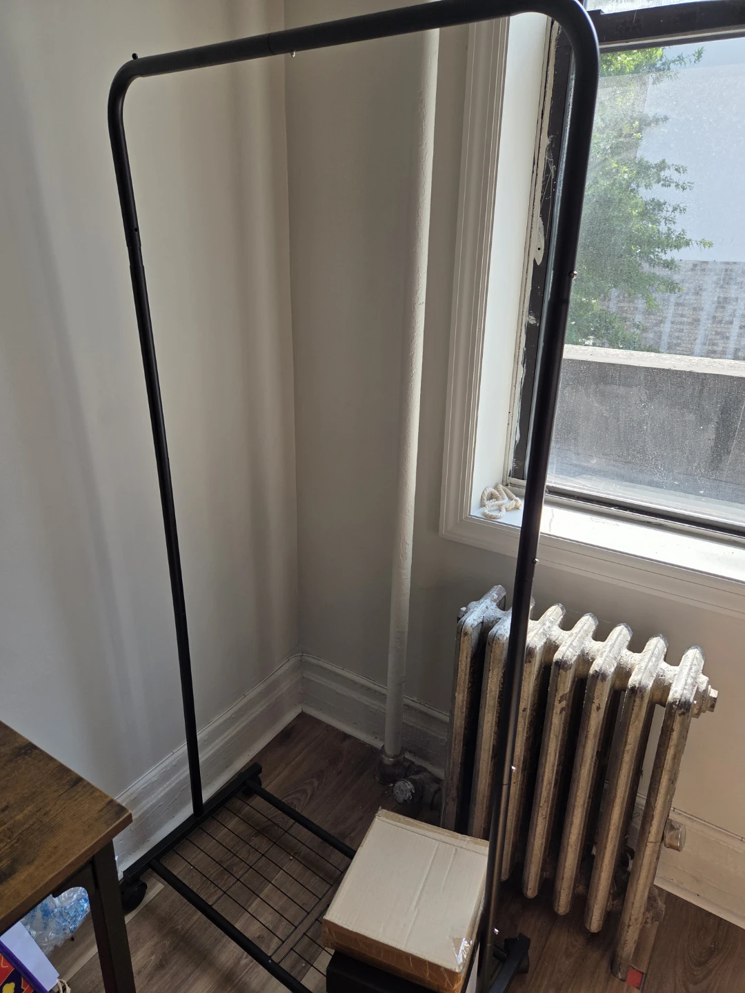 Black Metal Garment Rack with Wheels