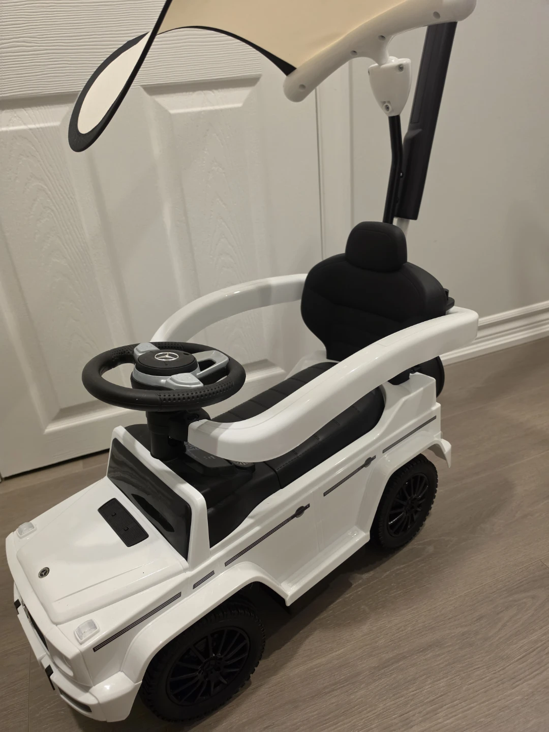White Mercedes G-Class Ride-On Car with Canopy and Push Handle