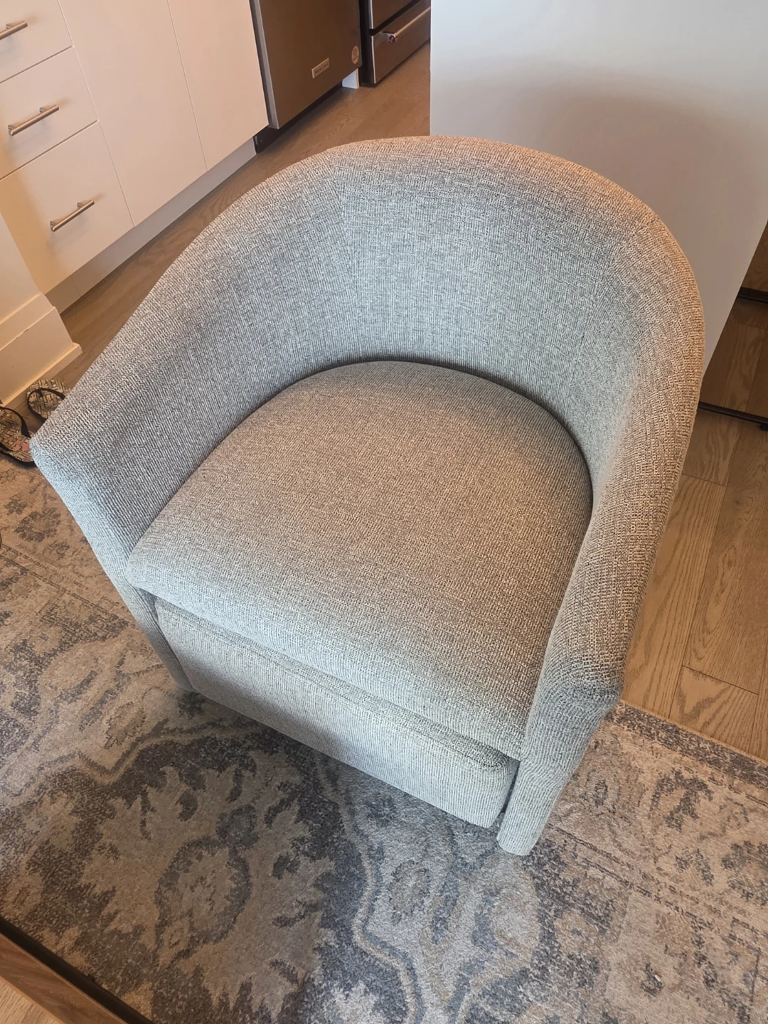 Grey Upholstered Armchair with Ottoman