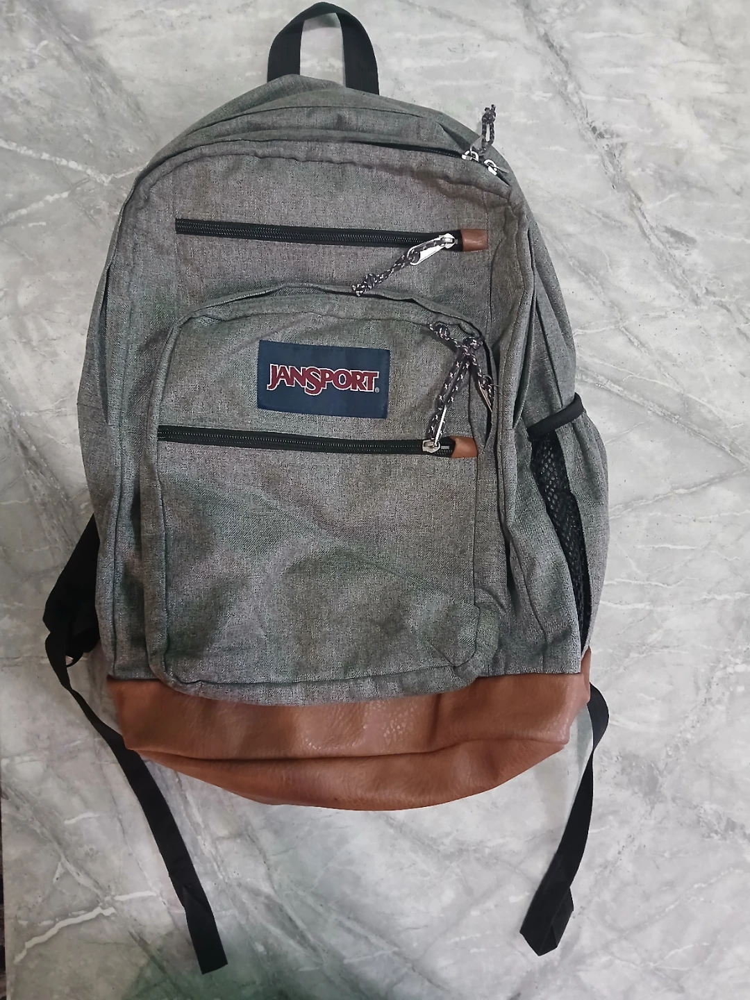 Jansport Gray Backpack with Faux Leather Bottom