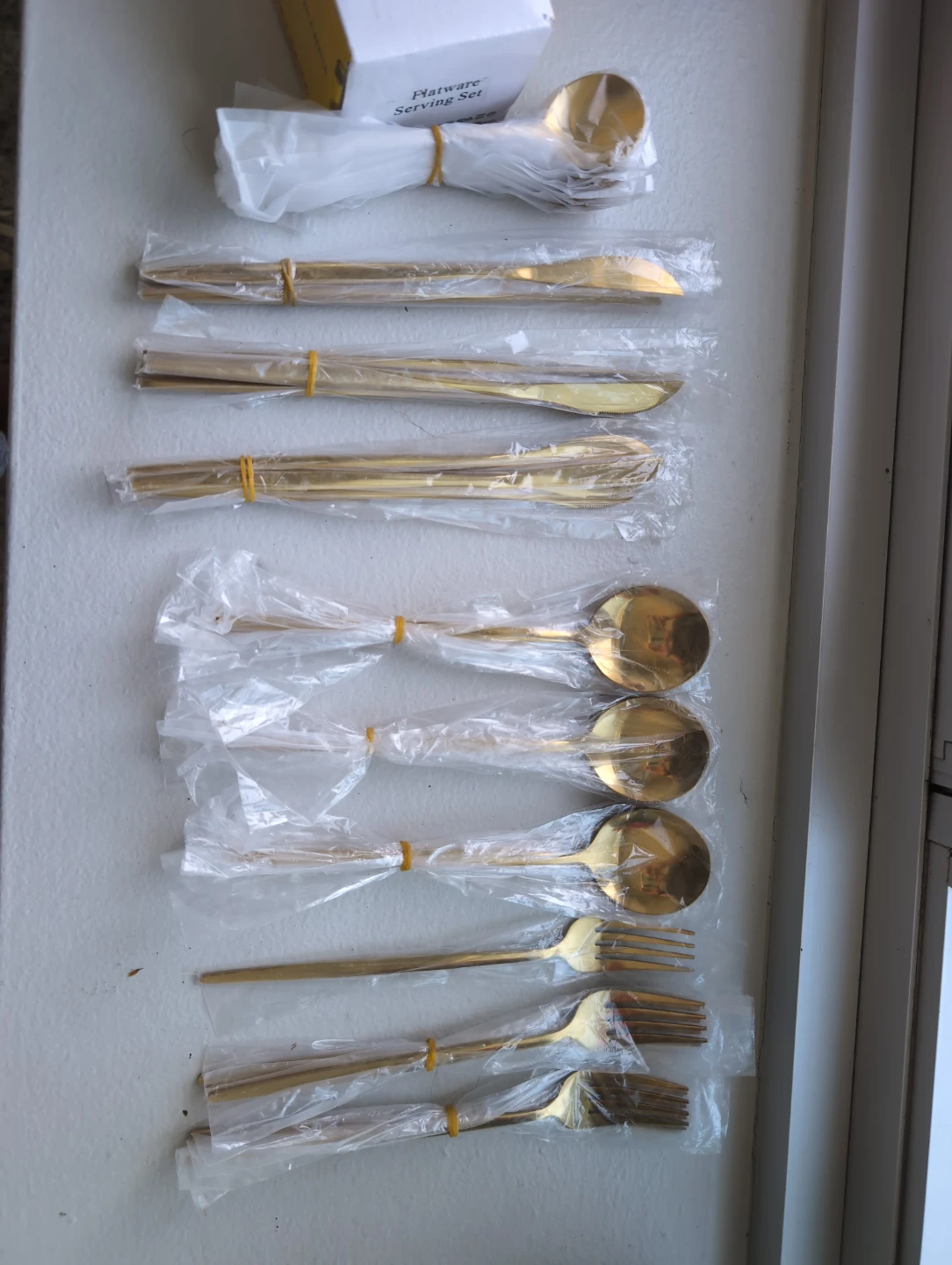 Gold flatware serving set (57 pcs)