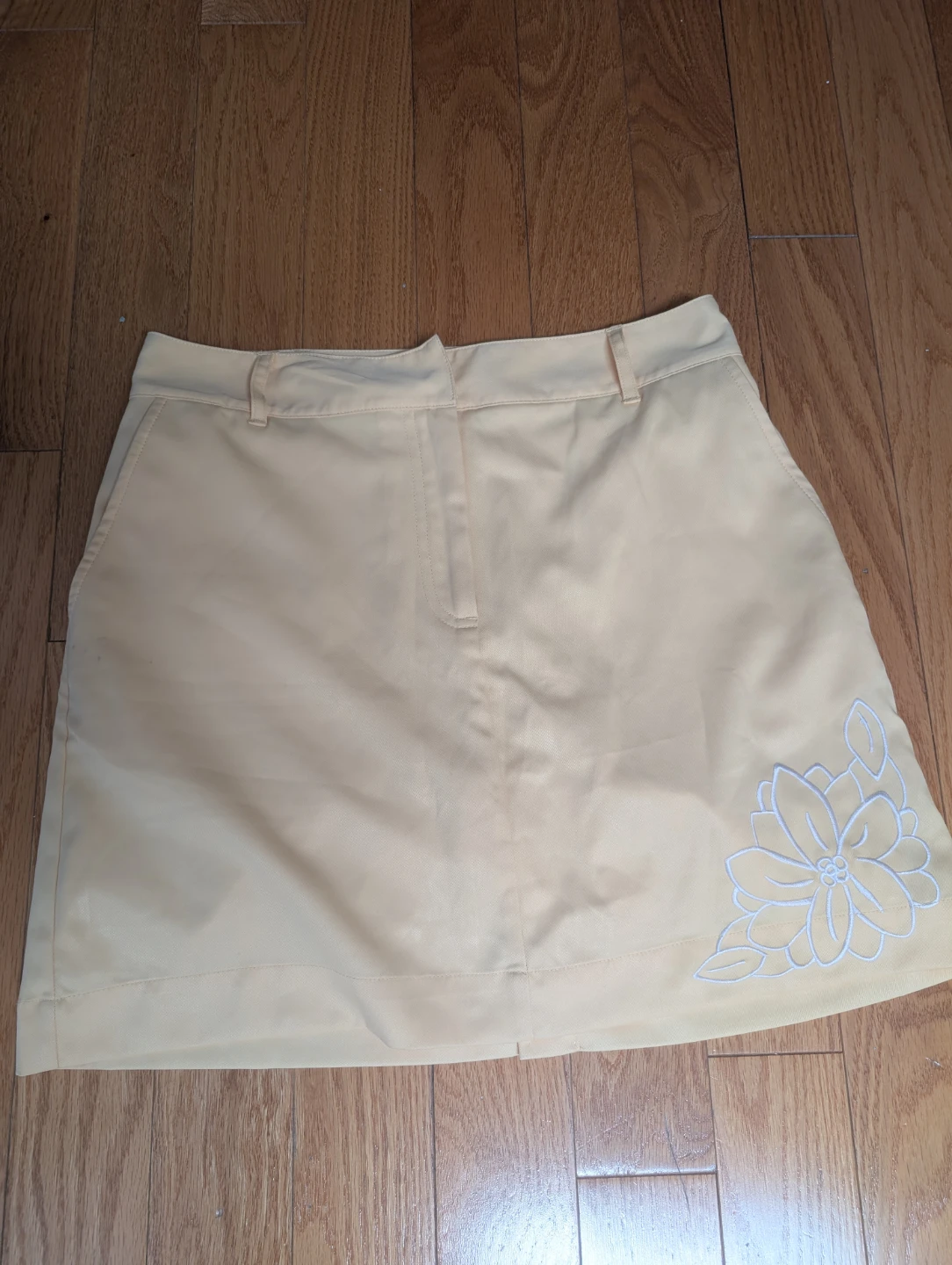 Women's IZOD Yellow Skort with Floral Embroidery