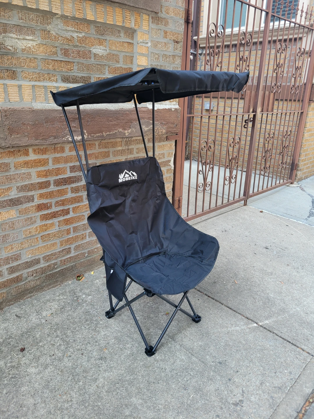 Brand new. MOBEIKE Black Camping Chair with Canopy