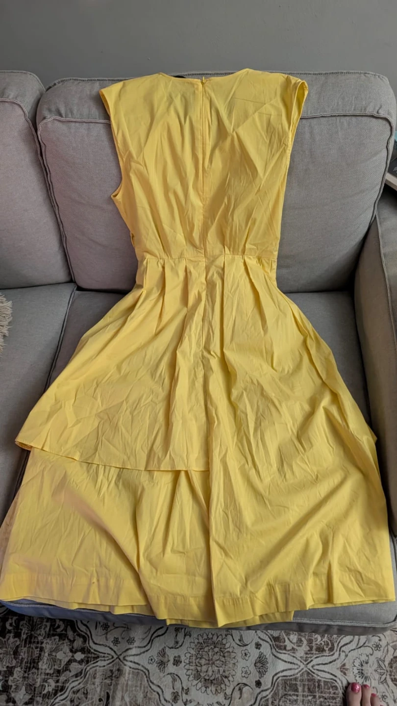Yellow Sleeveless Dress with Bow Detail