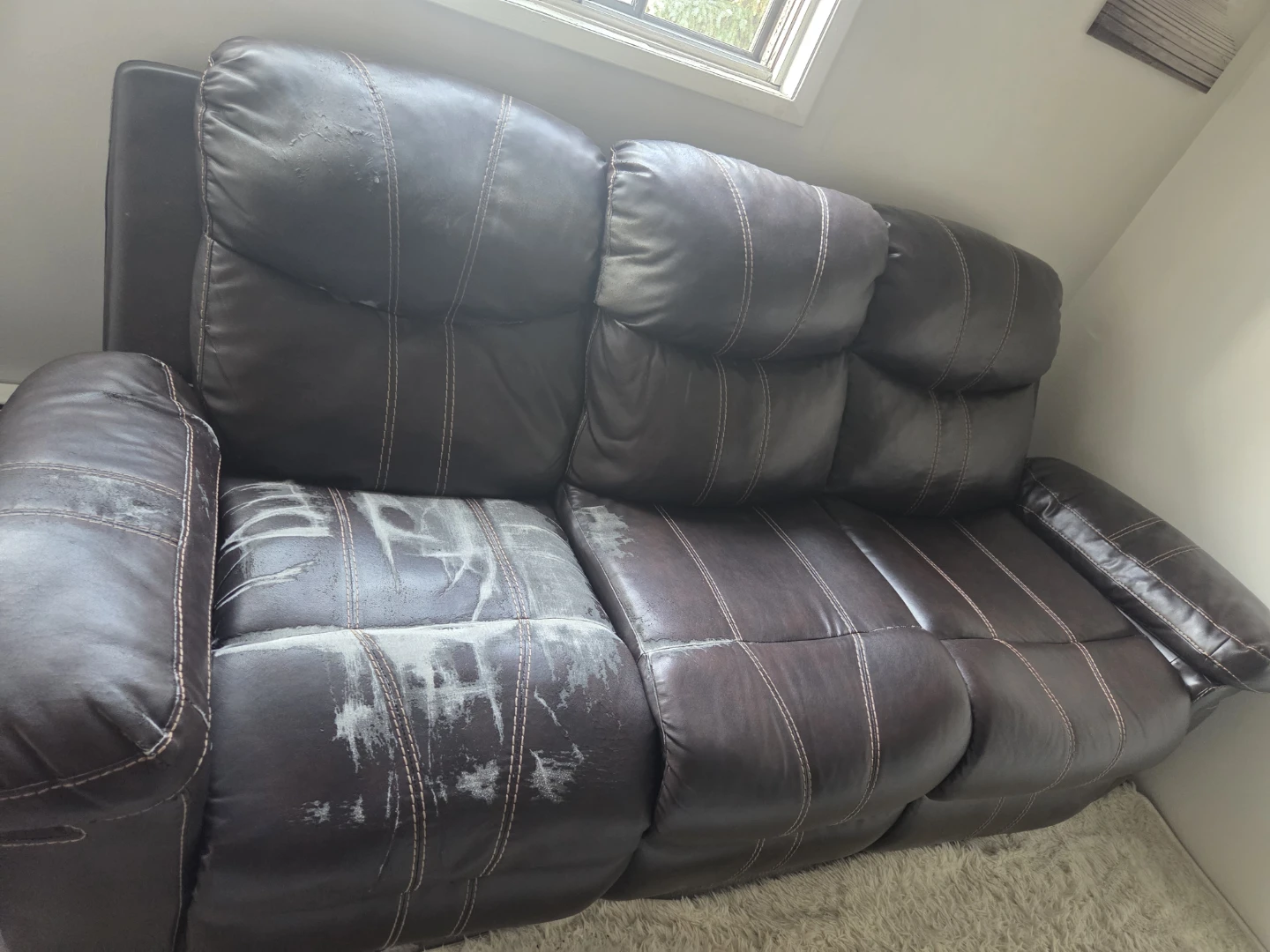 Brown Leather Reclining Sofa