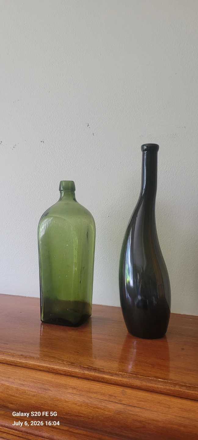 Green and Black Glass Bottles