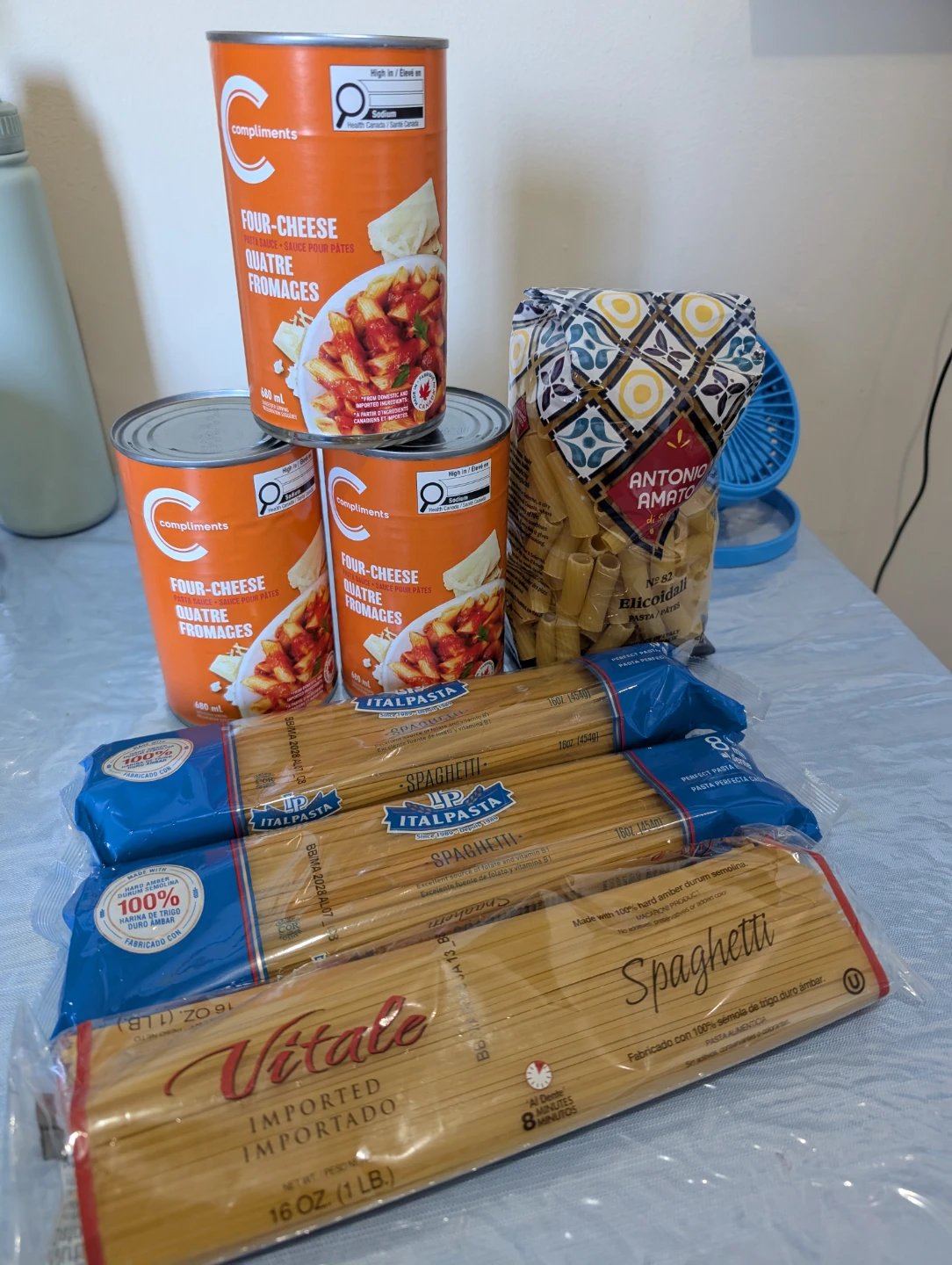4 Pasta noodles and 3 Pasta cheese tomato sauce