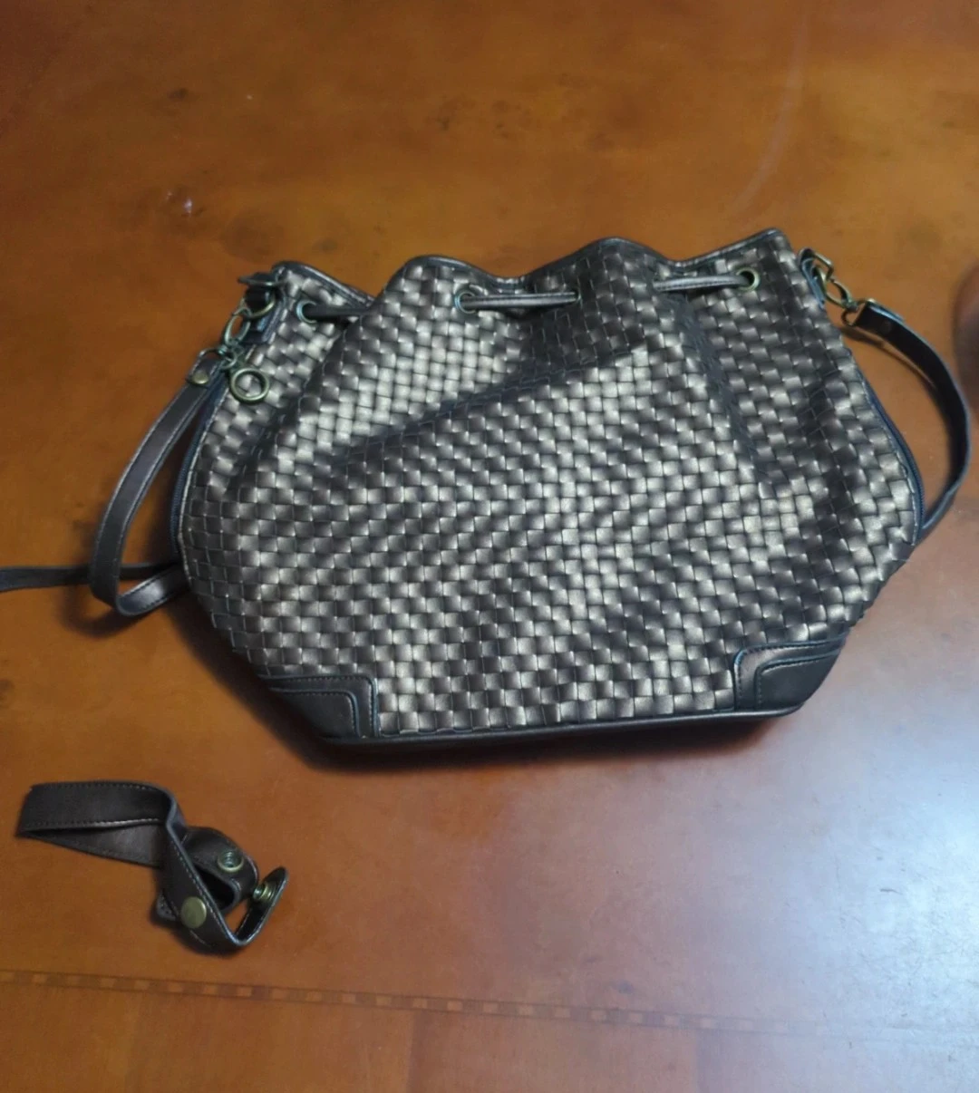 Metallic Bronze Woven Drawstring Bucket Bag