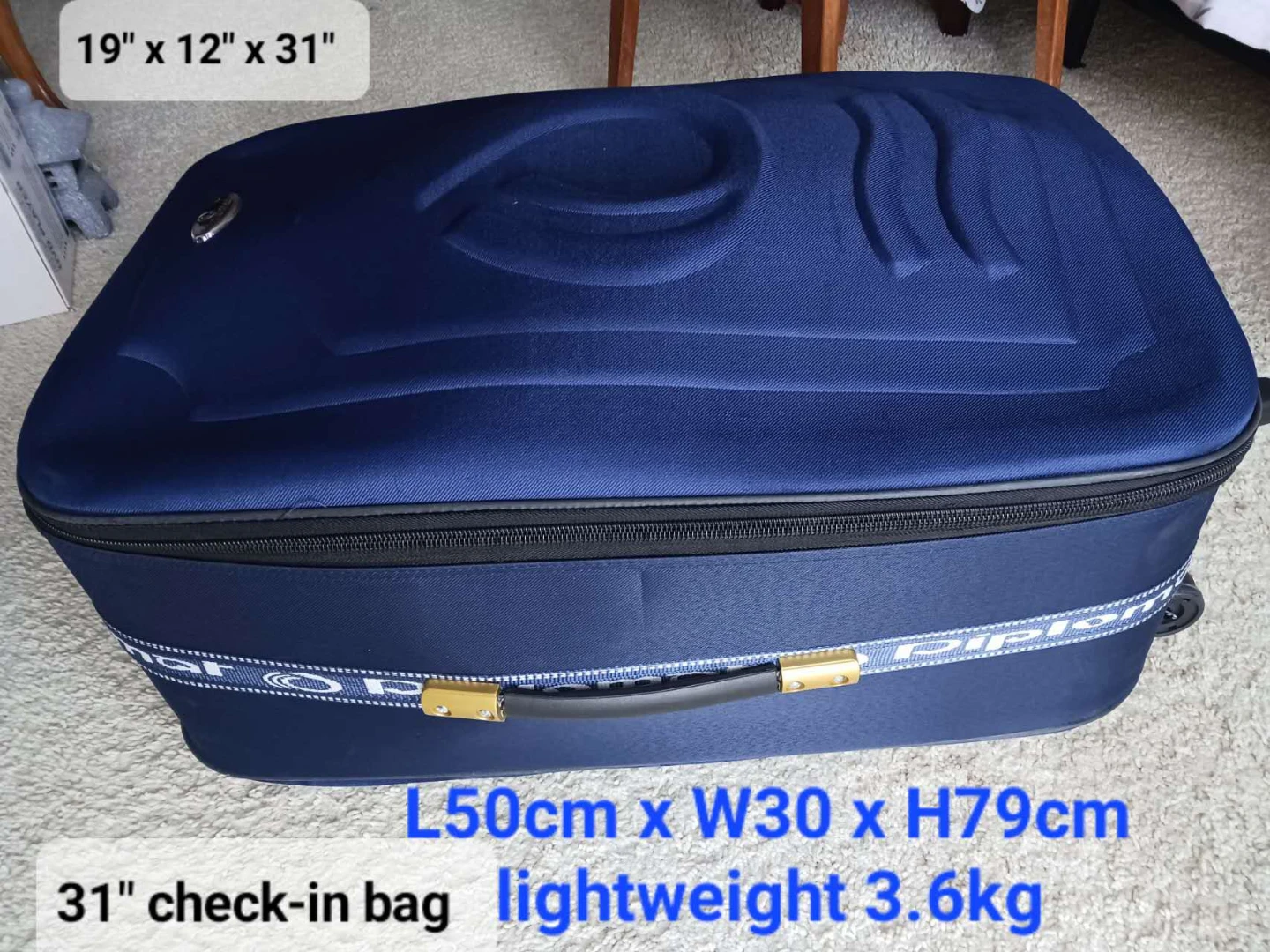 Blue Samsonite 31" Check-in Spinner Luggage