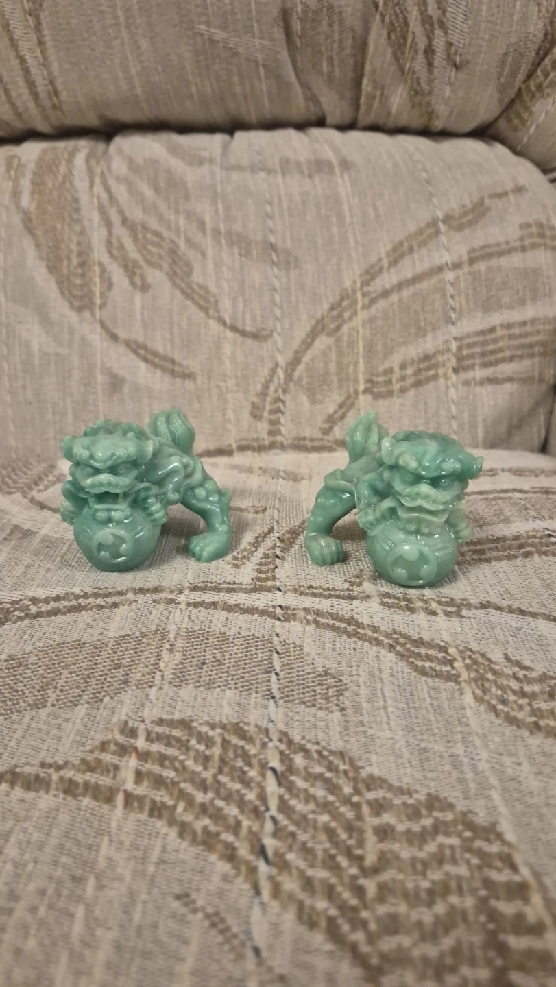 Pair of green foo dog statues