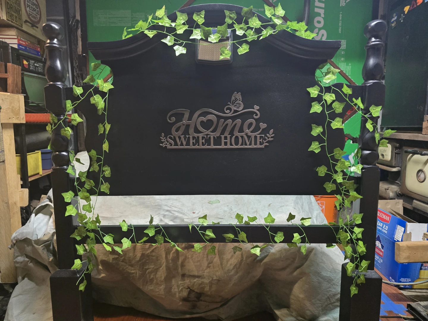 Black Headboard with "Home Sweet Home" Decor