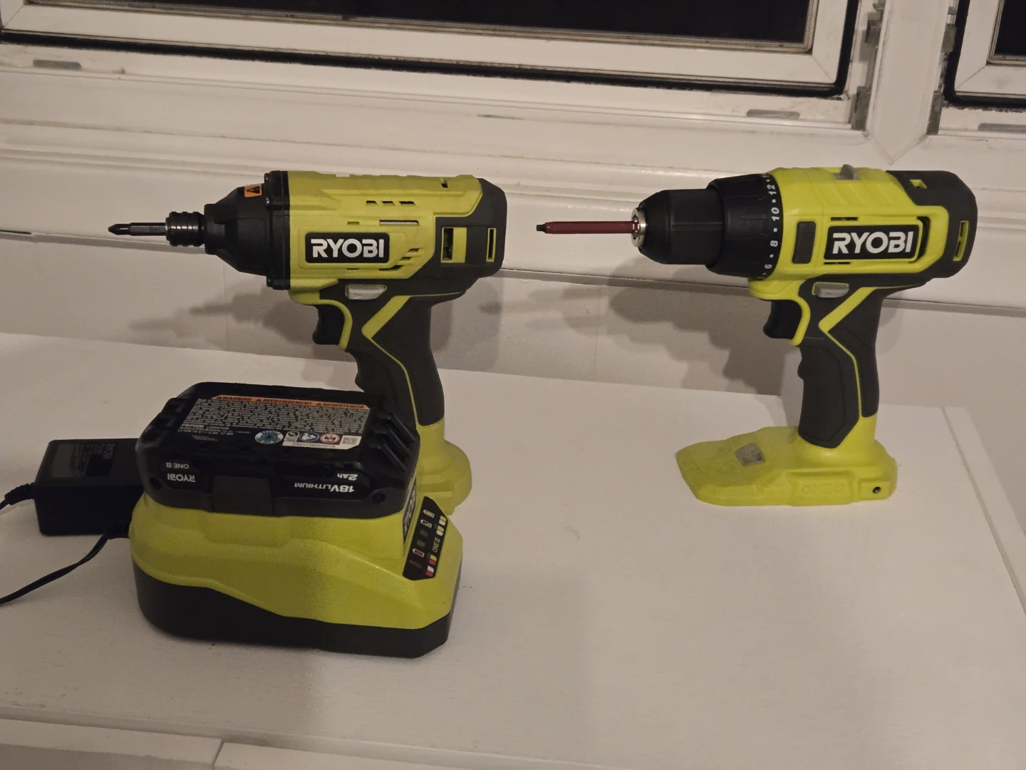 RYOBI Impact Driver & Cordless Drill With A Battery And Charger