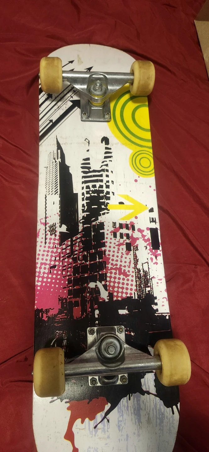 Skateboard with city graphic