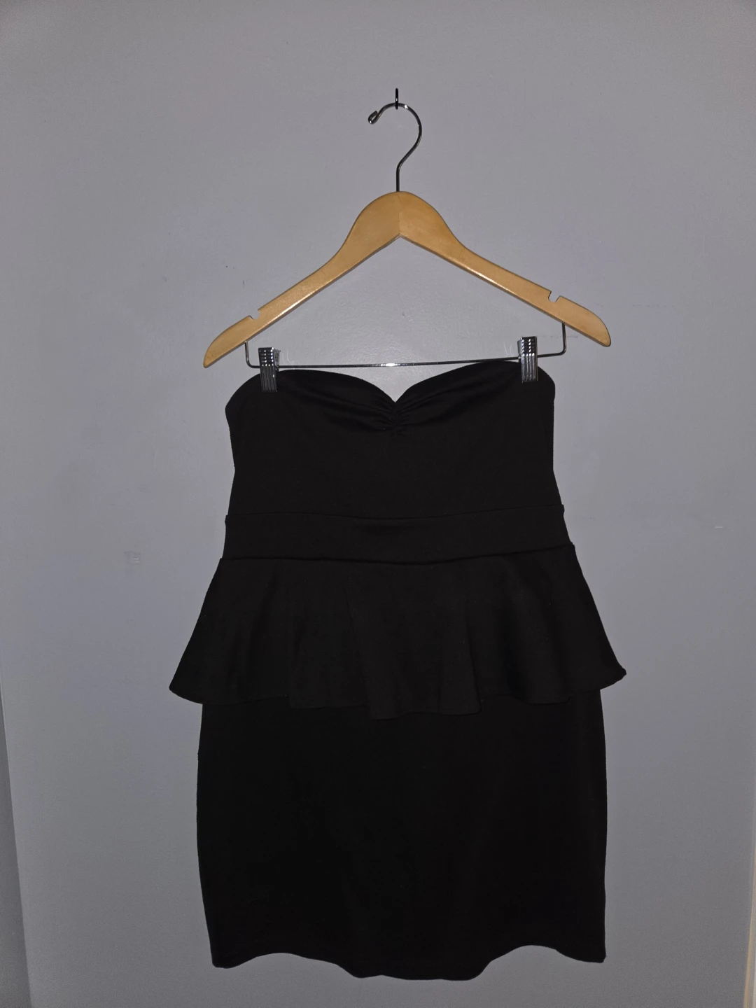 Black strapless peplum dress