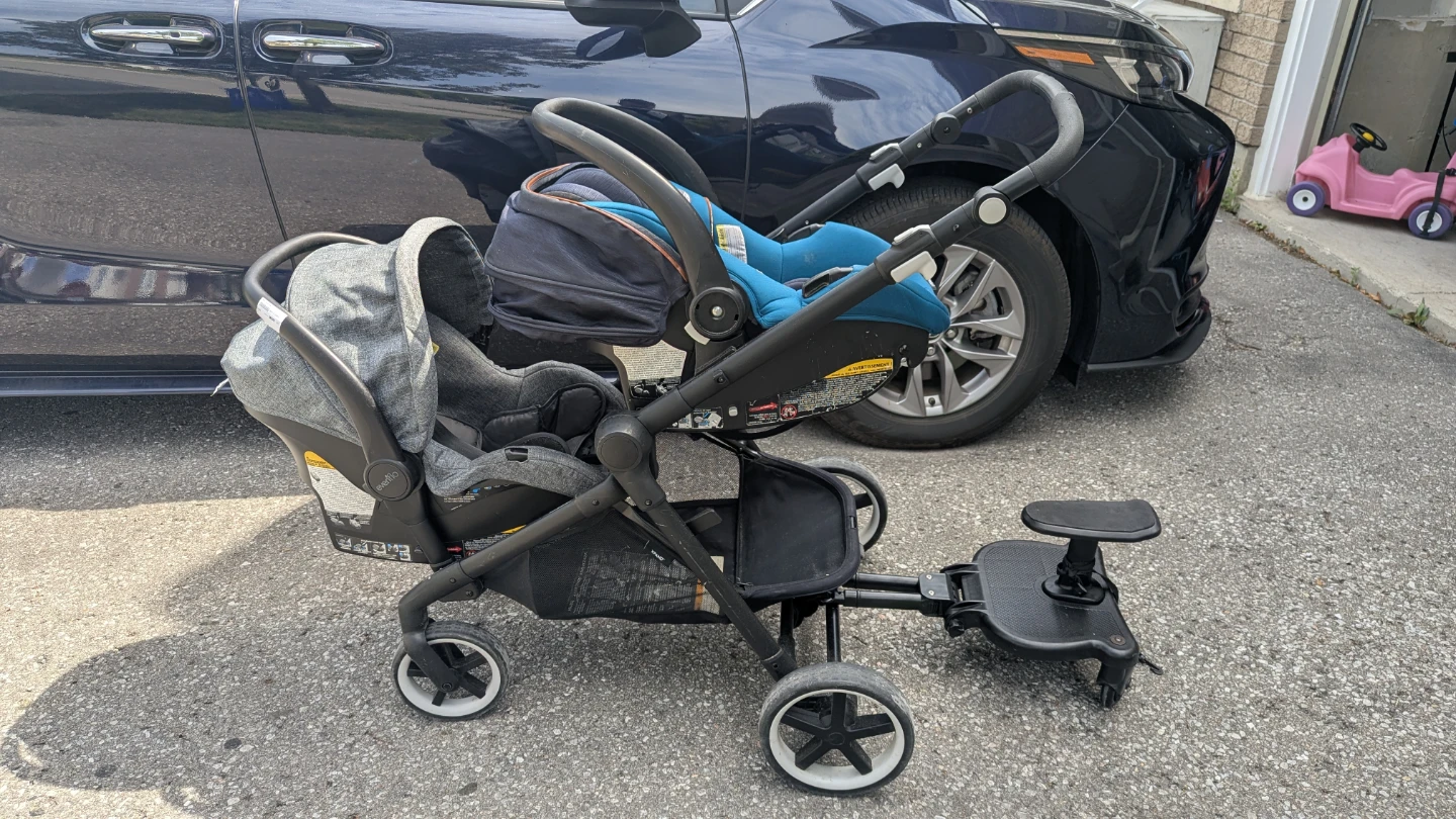 Eveflo Stroller with 2 Car Seats & Ride-Along Board
