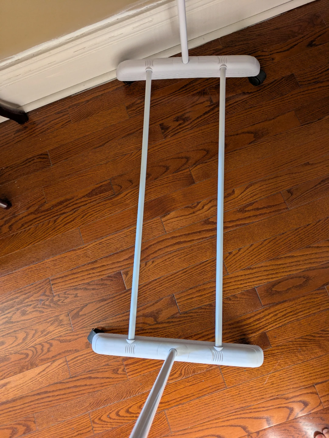 White garment rack with wheels - photo 3
