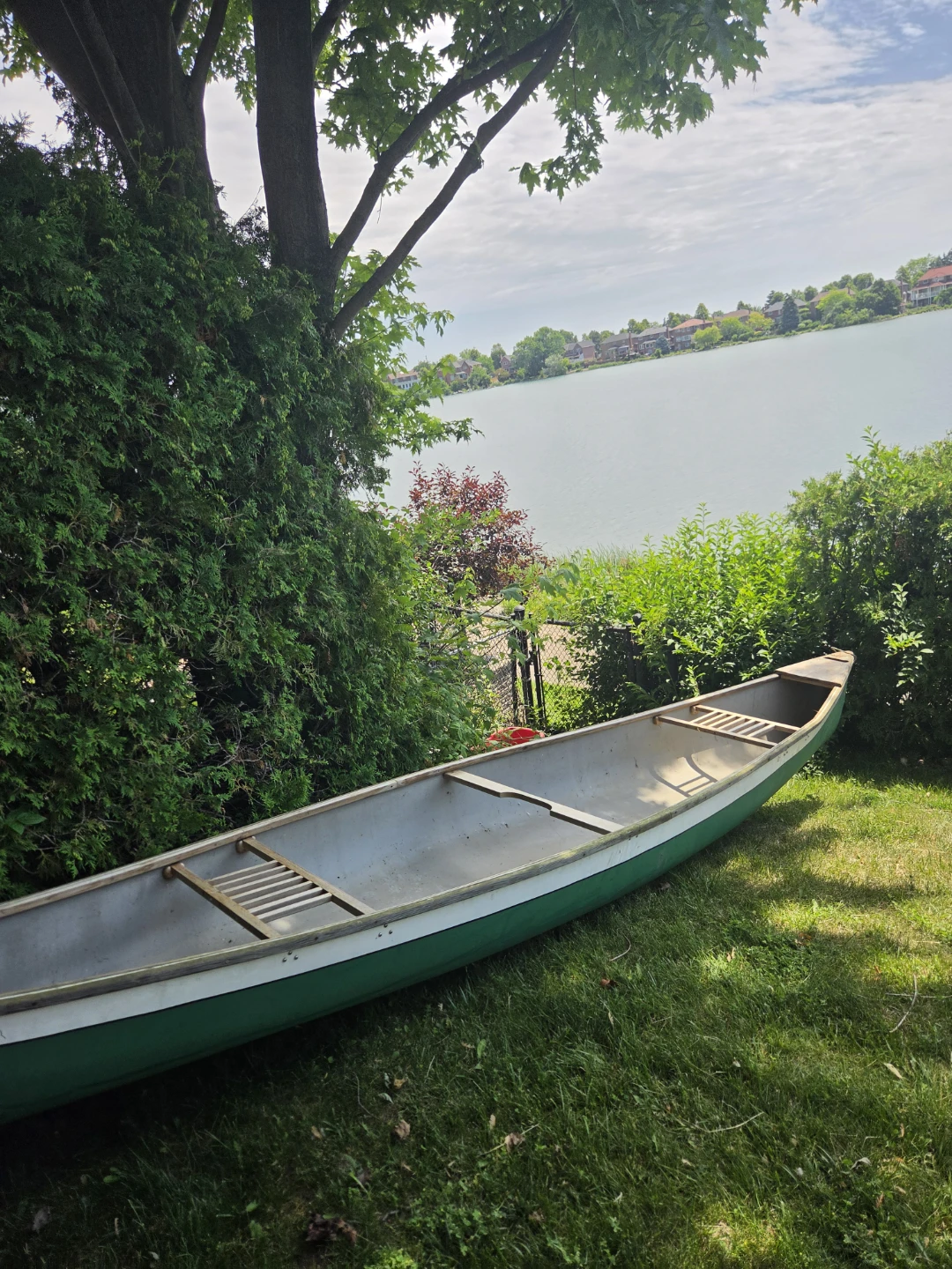 Green and White Canoe - photo 2