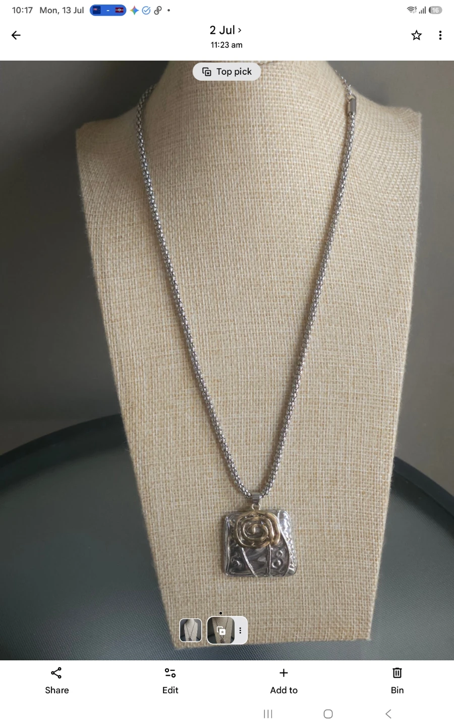 Silver and gold tone pendant necklace