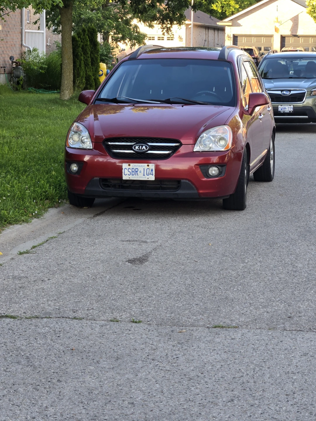 Red Kia Rondo
