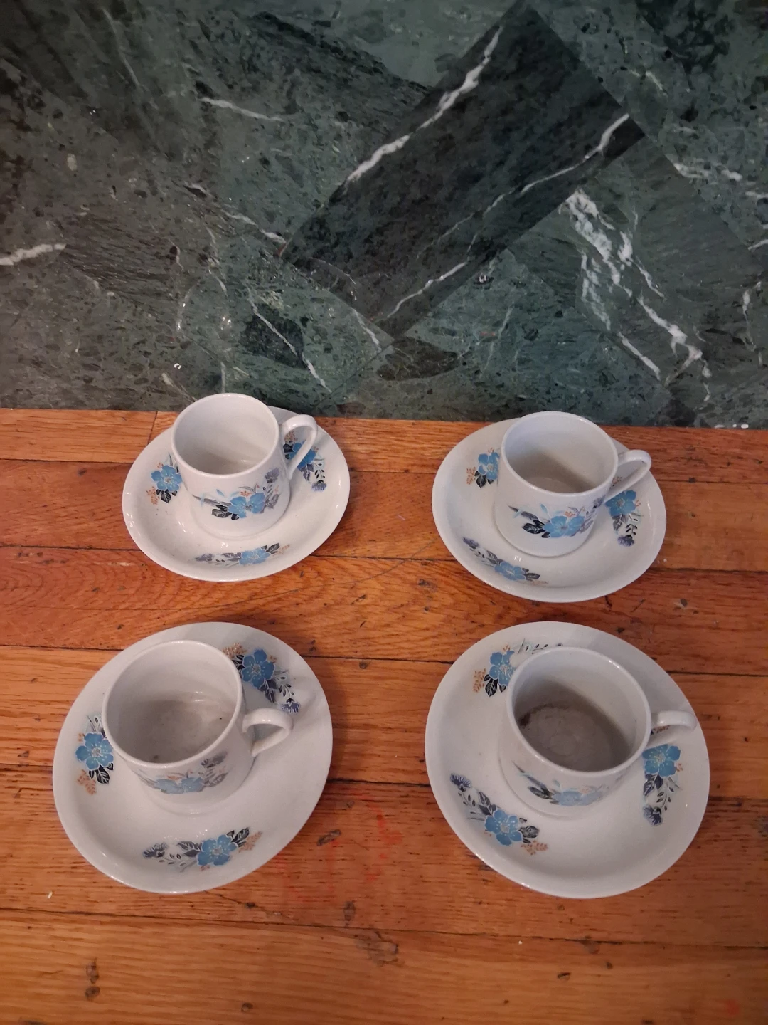 Set of 4 White Espresso Cups and Saucers with Blue Floral Design