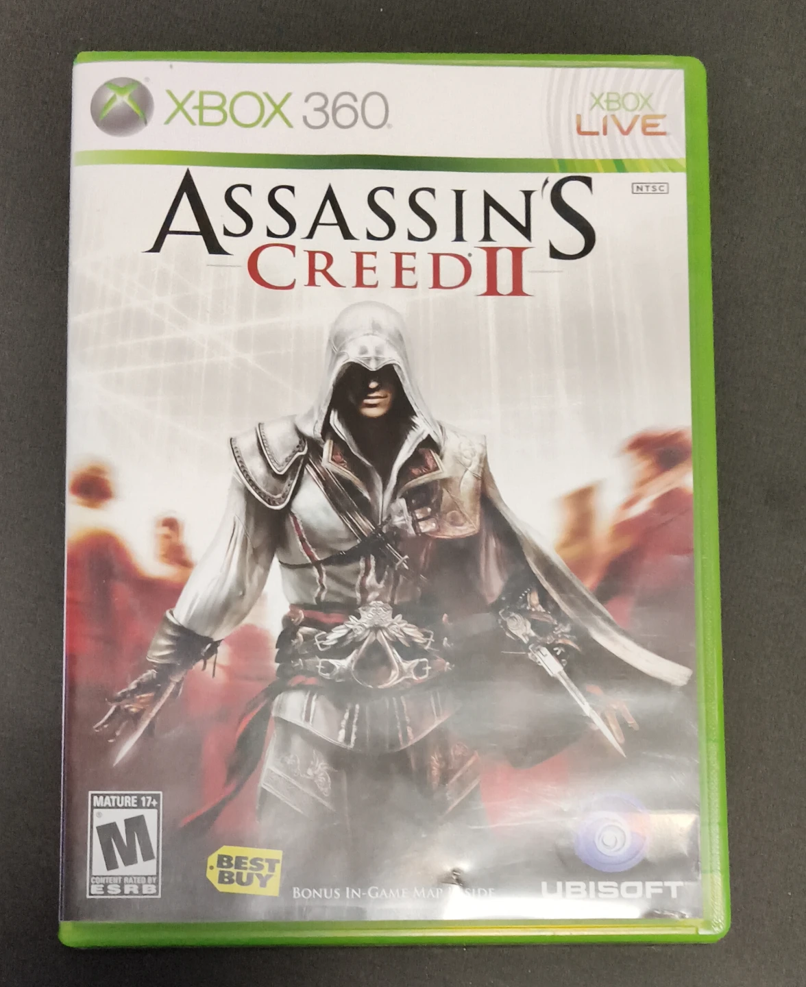 Xbox 360 games, assassin's creed 2 and SpongeBob heropants.
