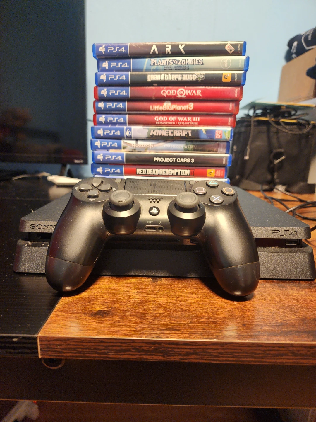 PlayStation 4 Console with Games and Controller