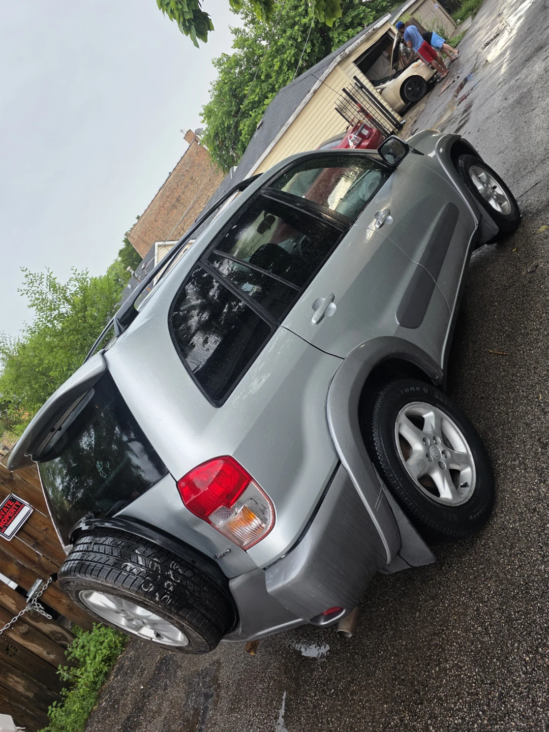 Silver Toyota RAV4 SUV - photo 3