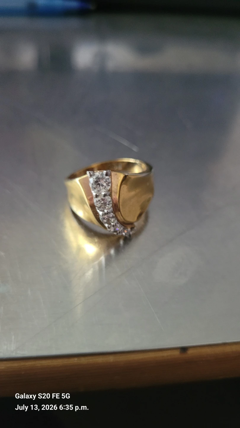 Gold Tone Ring with Diamonds ?