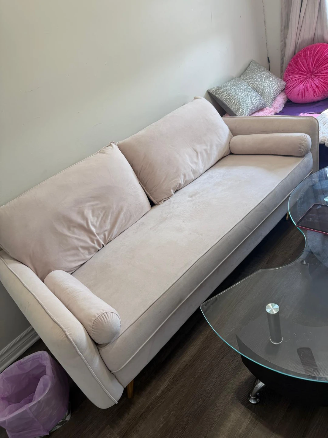 Pale Pink Velvet Sofa with Bolster Pillows