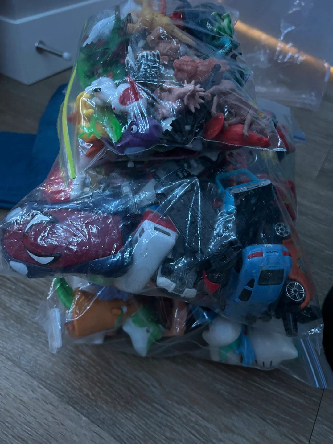 Bag of assorted toys and figures