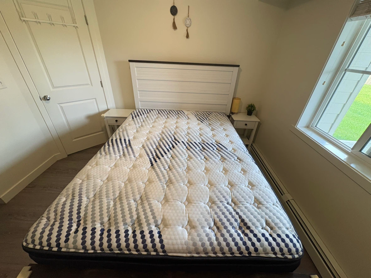 Queen Size bed, box and  Mattress with Blue and White Pattern.