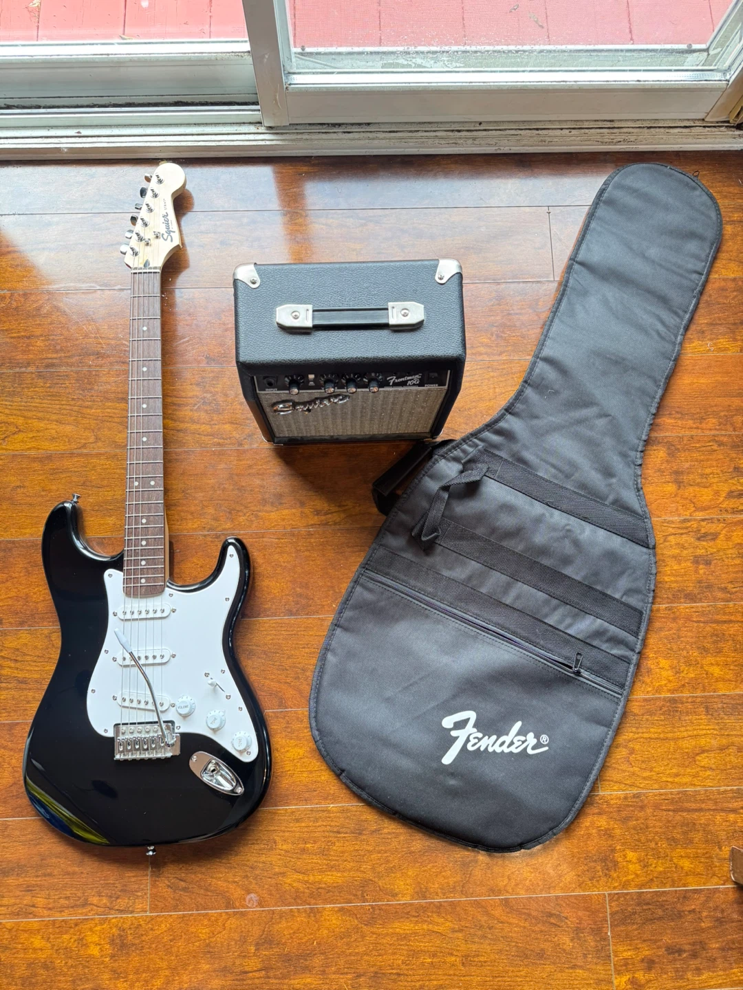 Squier Strat Electric Guitar with Fender Amp and Gig Bag